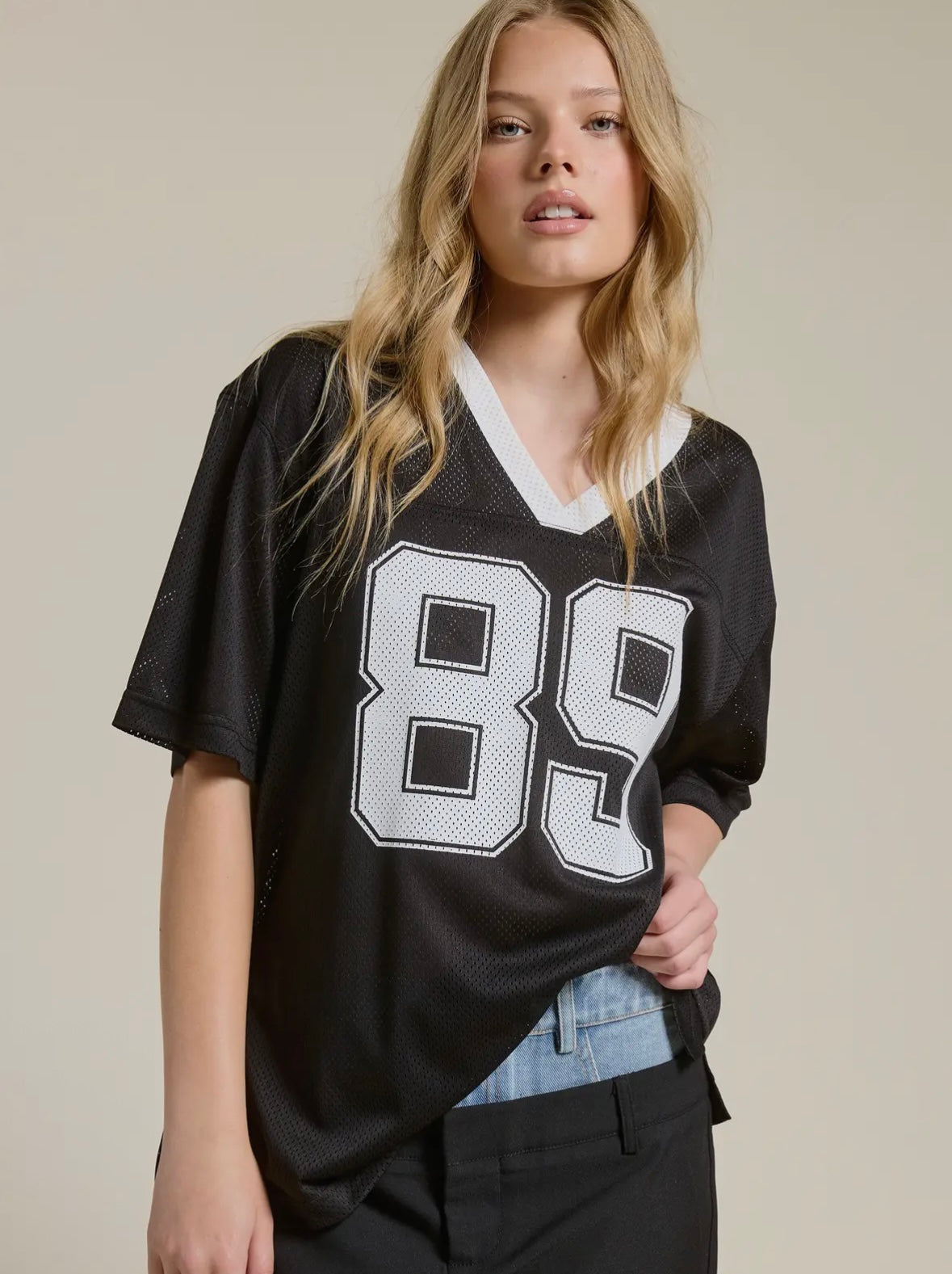 Sporty V Neck Jersey Top with 89 Graphic Print • BLACK