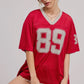 Sporty V Neck Jersey Top with 89 Graphic Print • RED