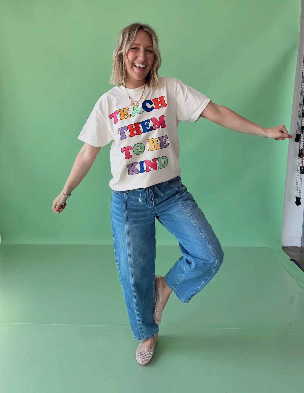 “Teach Them to Be Kind" Tee