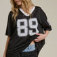 Sporty V Neck Jersey Top with 89 Graphic Print • BLACK