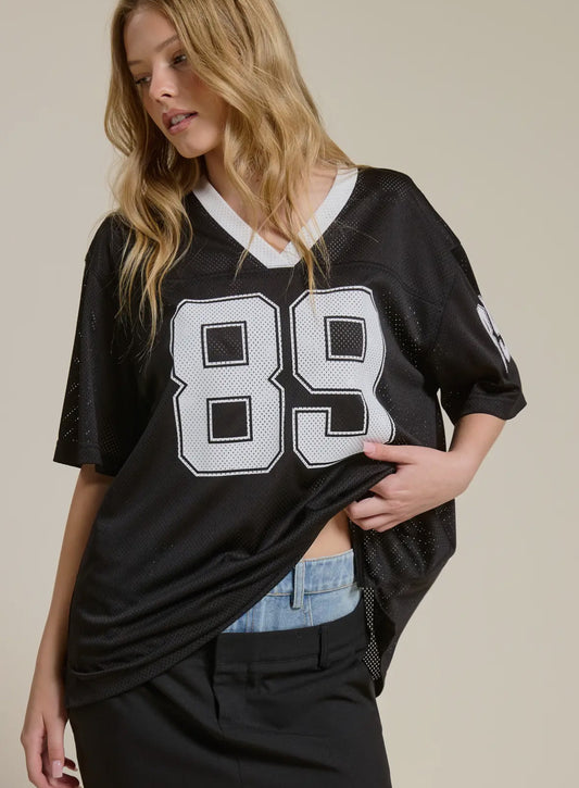 Sporty V Neck Jersey Top with 89 Graphic Print • BLACK